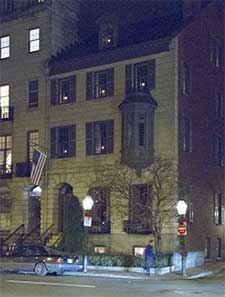 Beacon Street house with candles in each window.