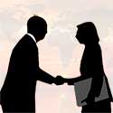 Man and woman shaking hands.