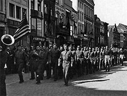 U.S. Airmen marching in Mother's Day Parade in Belgium, May 13, 1945.