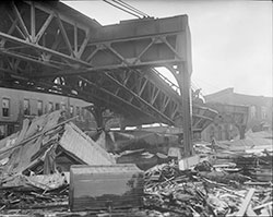 Photo of elevated railway tracks destroyed by flood.