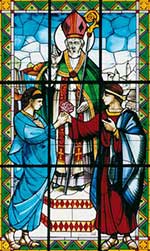 Stained glass window depicting Saint Valentine marrying a young couple.