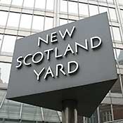 Sign in front of Scotland Yard's London headquarters.